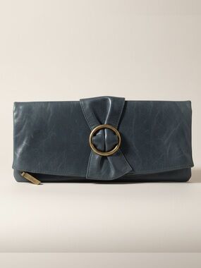 Hobo International leather fold over clutch with a distinctive brass ring detail